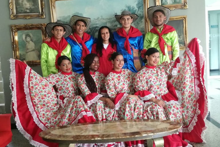 a group of people in colorful costumes posing for a photo