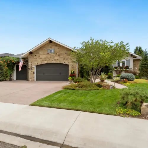 a house with a concrete driveway 