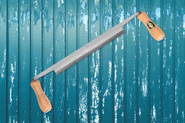 a drawknife up against a blue timber wall