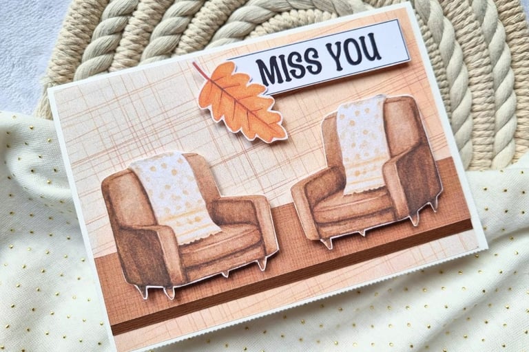 Handmade greeting card with two armchairs and "Miss You" sentiment