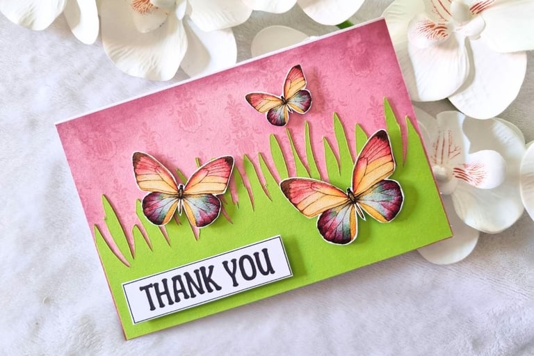 Bright and vivid handamde card with butterflies and "Thank you" sentiment