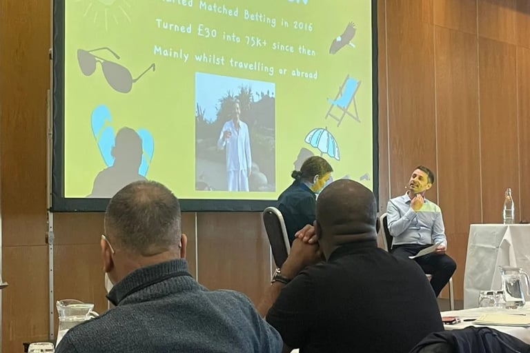 being interviewed and speaking on stage at a seminar