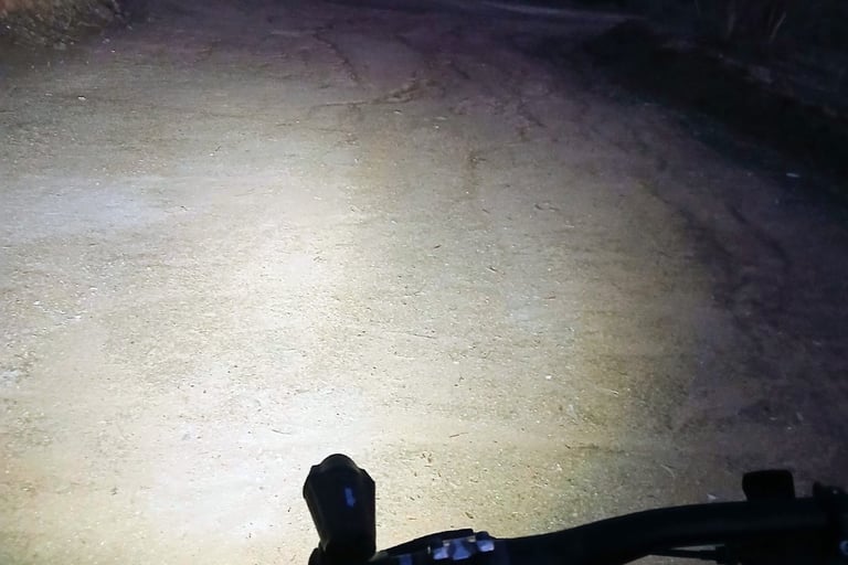 pov of mtb night light on handlebar
