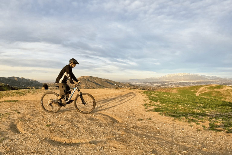 rider getting ready to do a rear wheel lift mtb