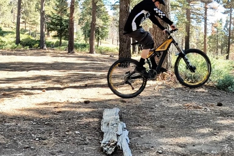 mountain biker getting air with the bump jump