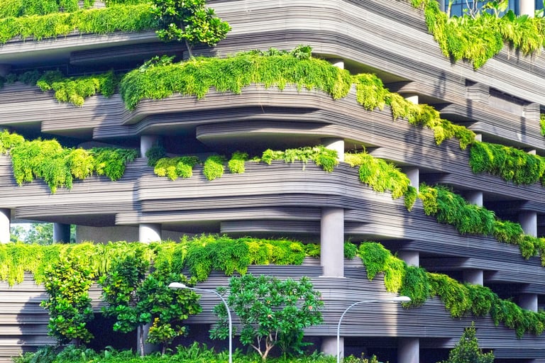 a building with a bunch of plants growing on the side of it