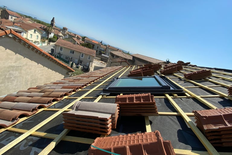 pose velux et tuile sur toiture 