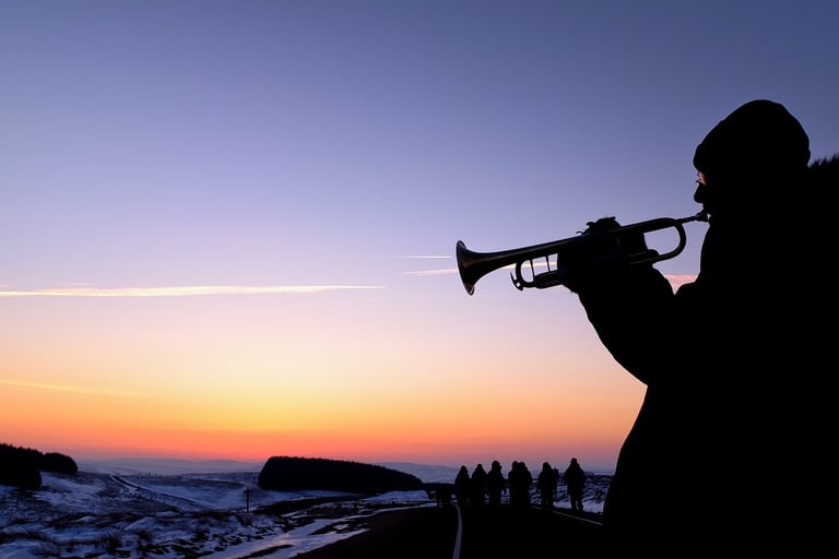 Man playing trumpet on the Epynt for Easter Morning Service