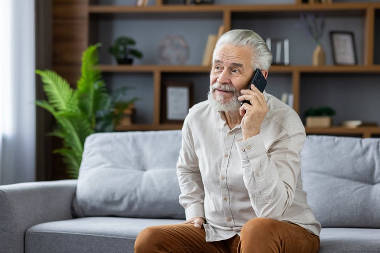 Elderly patient calling All Services Home Health to request in-home care