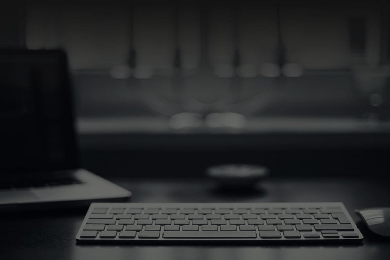 a keyboard and a mouse on a desk
