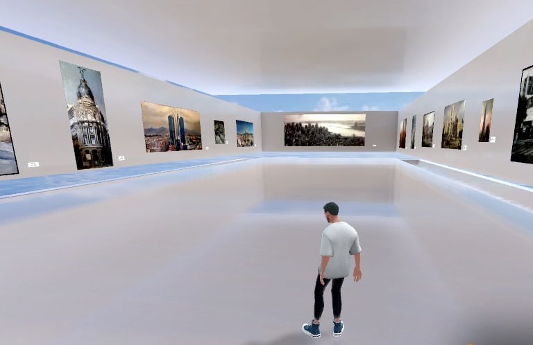 a man in a white shirt is standing in a room with a skateboard