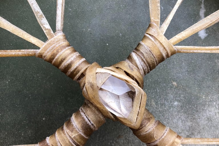 Shamanic drum birthing, buffalo with quartz crystal