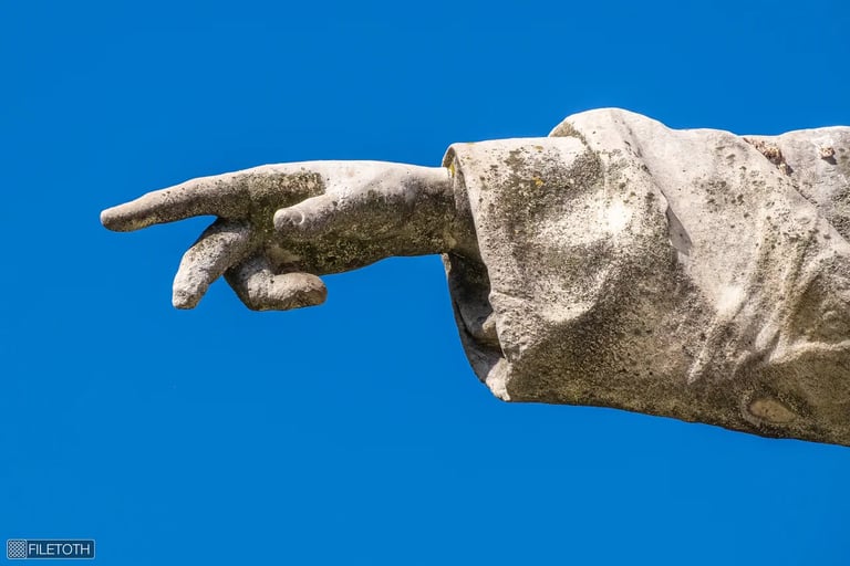 Close-up of Péter Pázmány's right hand pointing forward, symbolizing guidance and revival.