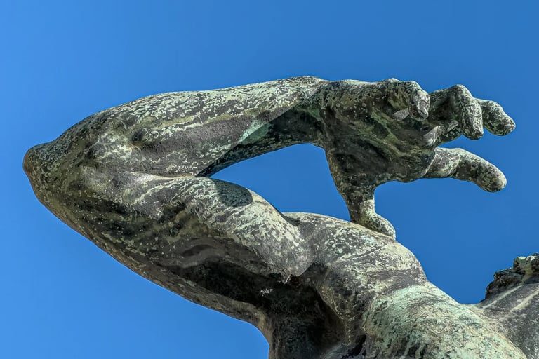 Close-up of the archer’s releasing hand, capturing a sense of strength, tension, and vigor.