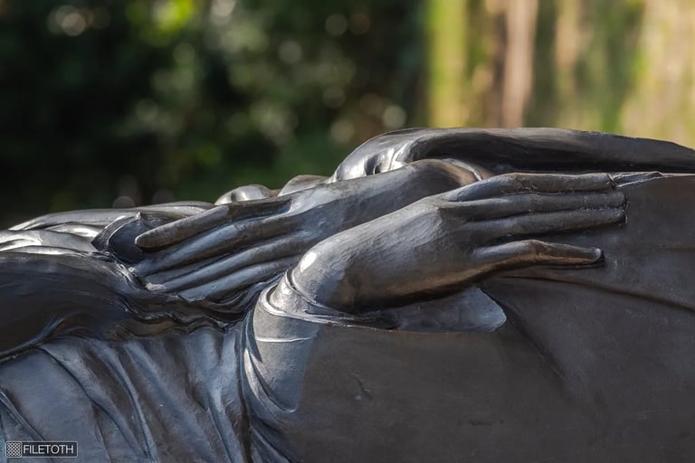 Close-up of the Buddha’s hands in a meditative gesture, conveying tranquility and mindful presence.
