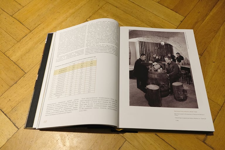 An open book. Text and big photo from the Soviet time bar. 