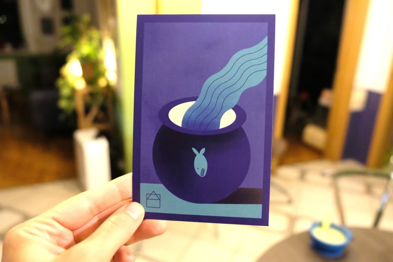 Postcard with a illustration of a ceramic pot, fish and water. 