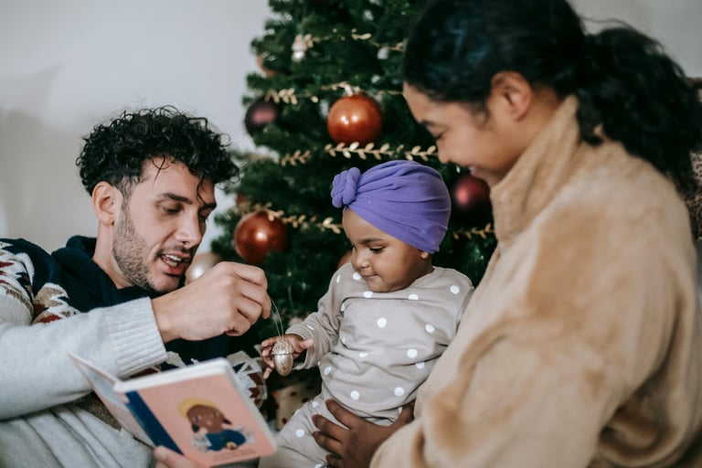 Parents reading book to child