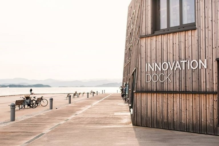 a wooden building with a sign that says innovation book