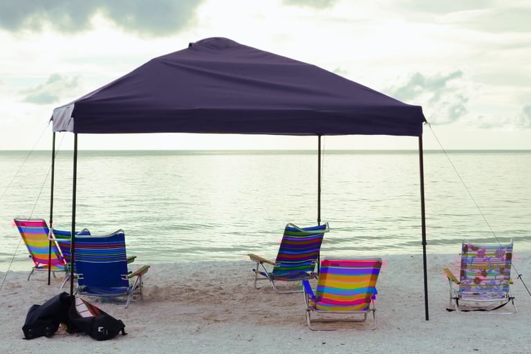 pop-up canopy providing shade at the beach