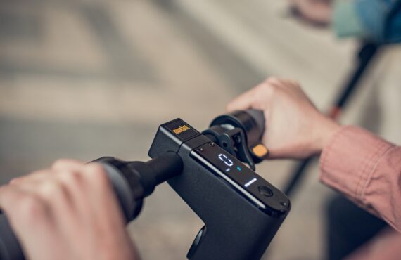 a person holding a camera and taking a picture