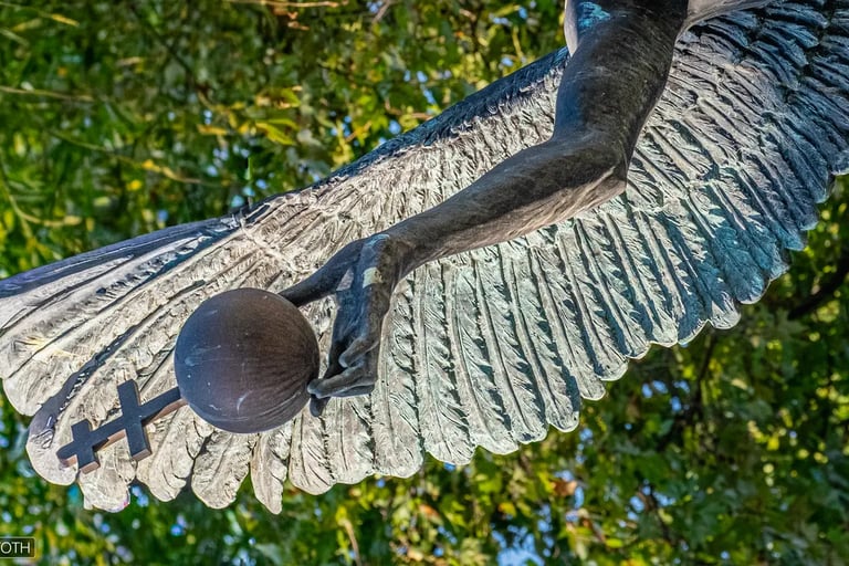 Close-up of Archangel Gabriel’s hand as the orb tumbles from his grasp, symbolizing loss and pain.