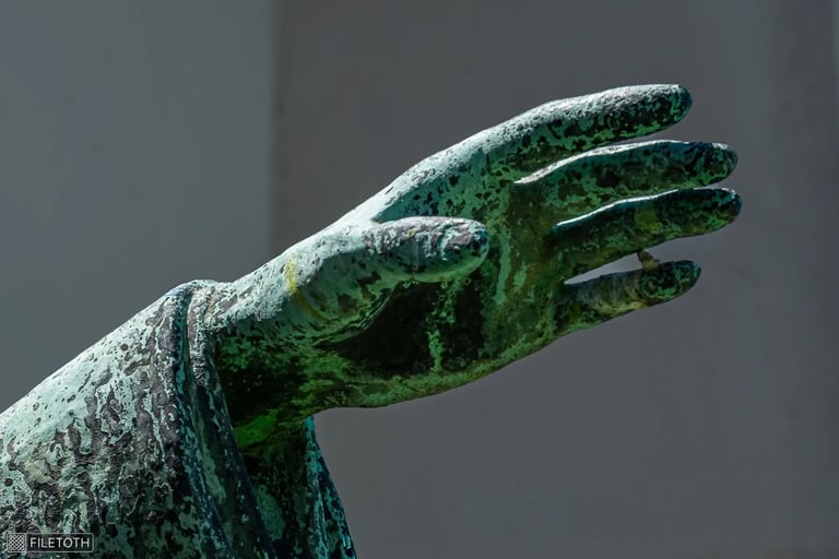 Close up on the hand of broether Julianus pointing eastward.