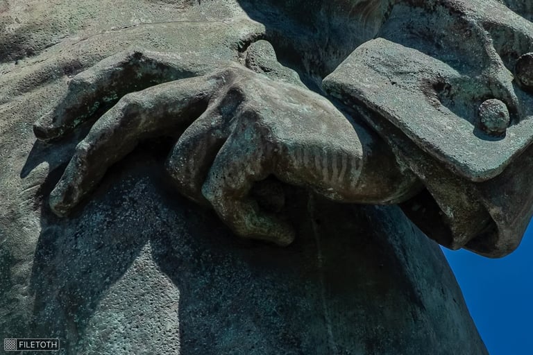 Baross’s left hand on his hip, relaxed yet conveying firm authority.