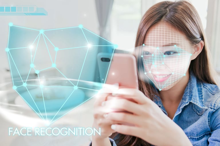 image of girl with smartphone using Facial Recognition app