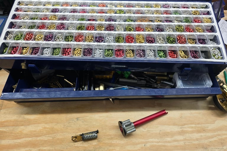 Toolbox of locksmith pins representing trusted Jack’s Locksmith local rekey services of Asheville, NC