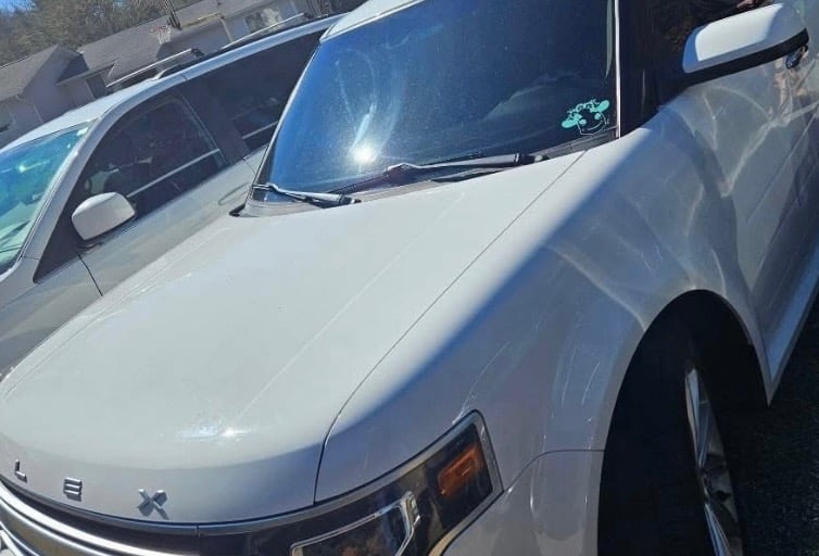 White Ford Flex unlocked by locksmith in Burnsville NC without door damage