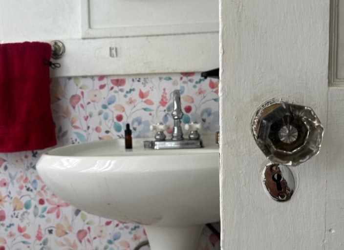 Bathroom door lock representing residential locksmith service in Asheville, NC — rekeying, lock installation, & home lockout