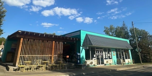 Yellow Mug coffee shop representing commercial locksmith in Weaverville including smart locks and master key systems