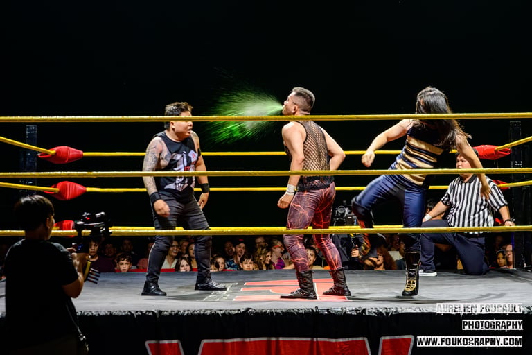 Khoa Truong spits mist at partner Henry VPW Spring Bash 2026