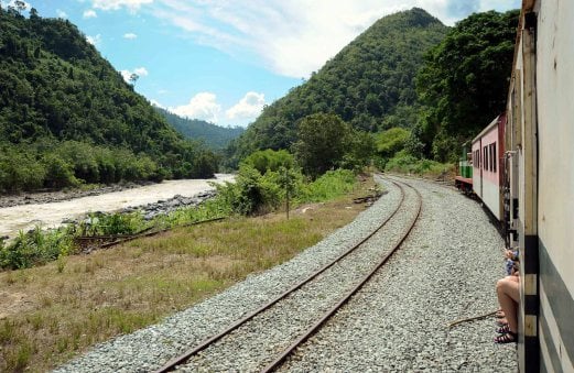 Scenic train ride to Padas river rafting