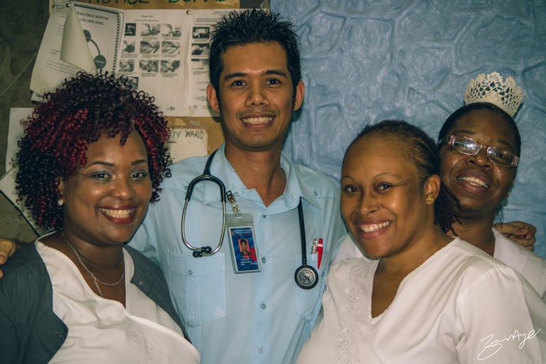 Dr Zaw among three lovely Jamaican Nurses 