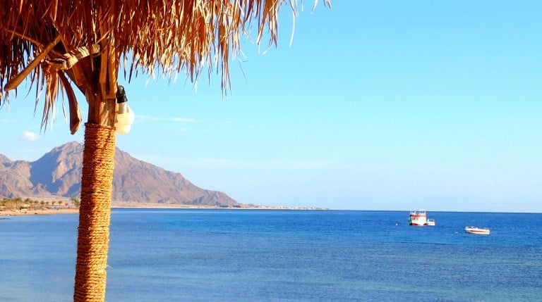 Coastal highway road from Taba to Ras Shitan with Red Sea and desert mountains in Egypt