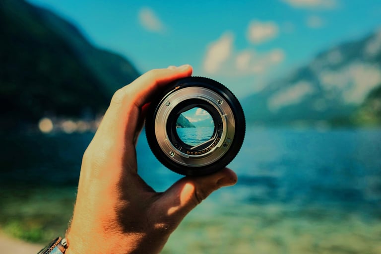 Camera lens focused on blue water, symbolizing Buckeye Venture Group’s real estate vision