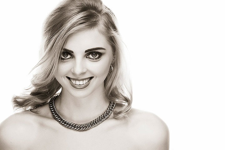 a woman with a necklace