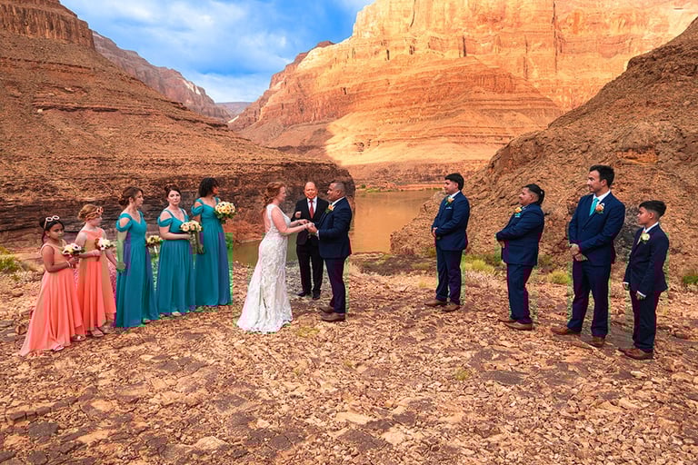 a wedding party in a canyon