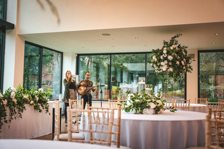 musicians singing in wedding venue