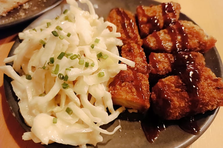 Piatto plant-based gourmet di Giardì con ingredienti vegetali e presentazione contemporanea