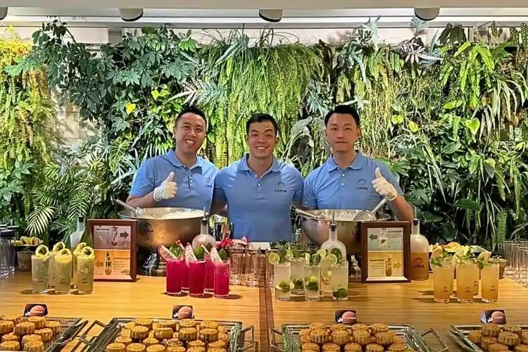 Loma mixologist team serving a menu of Signature cocktails at a Hong Kong corporate event.