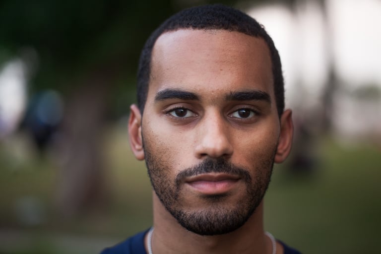 Portrait of Justin LaSuere Mabrie, Qatar — Faces of Qatar project. Photo: Mohammed Zarrugh Ismail