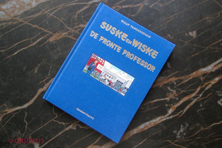 a comic with a blue book cover and a picture of a building