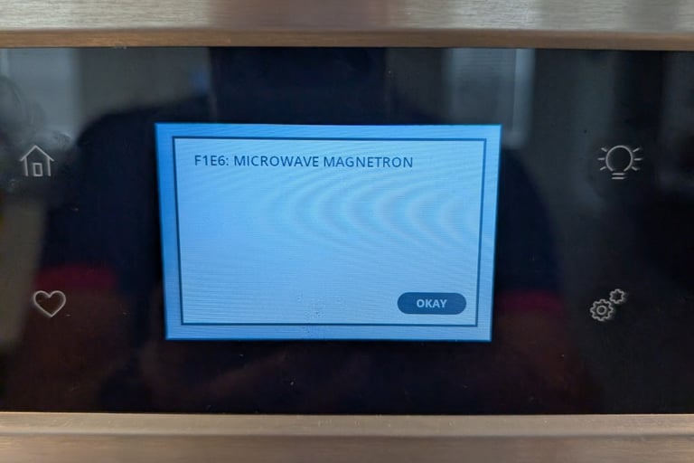whirlpool microwave f1e6 error code