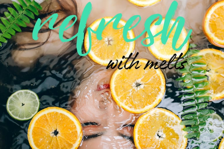 Cayla Henri Wax Melts: a woman in a bathtub with oranges and lemonade