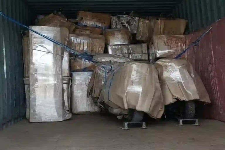 Secure household goods and bike in a transport container by Seemanchal Packers and Movers in Purnia.