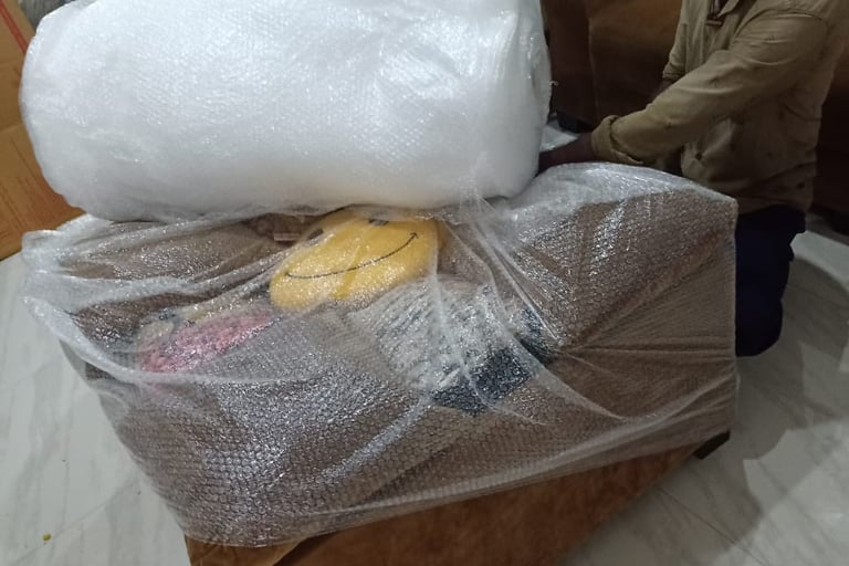 Professional sofa packing with bubble wrap by Seemanchal Packers & Movers for safe house shifting 