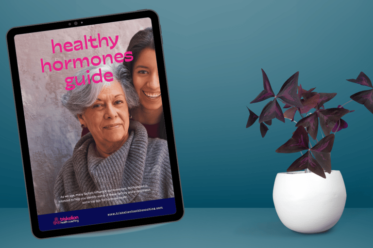 image of a ipad with the screen showing a healthy hormones guide and a plant next to the ipad.